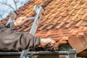 cleaning gutters yourself is time-consuming but not hard